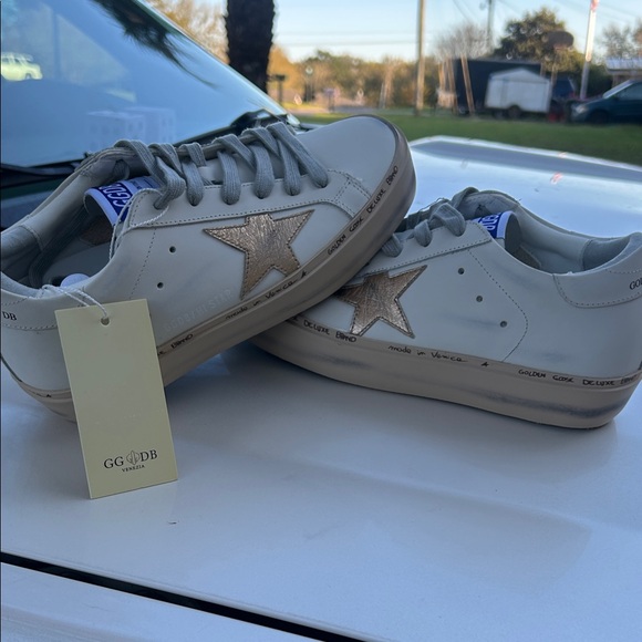Golden Goose White and Gold Sneakers